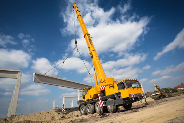 Crane boom picking heavy load